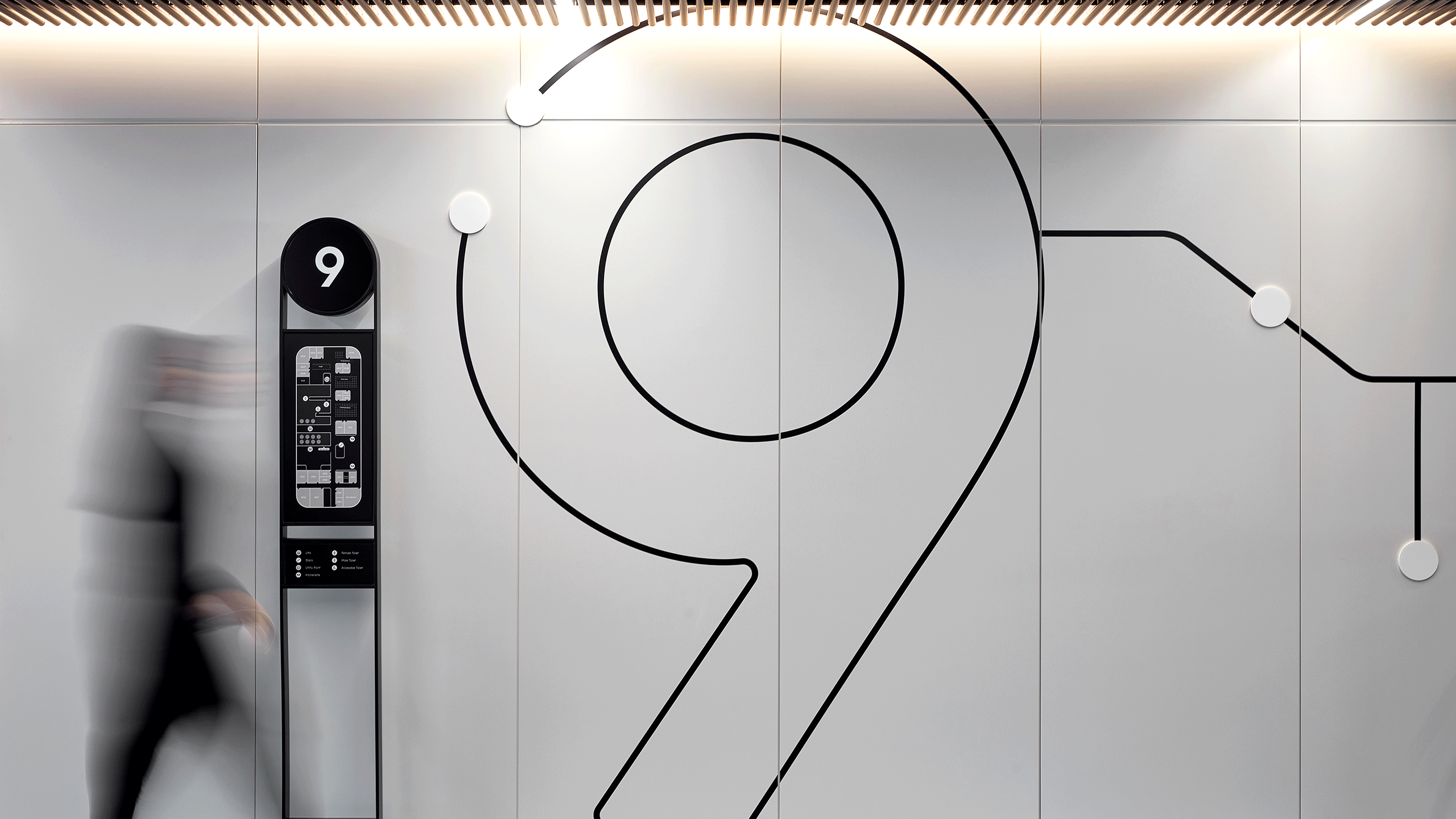 Woman standing infront of sign